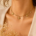 Marie – Collier acier inoxydable perles eau douce pendentif soleil – Karélia